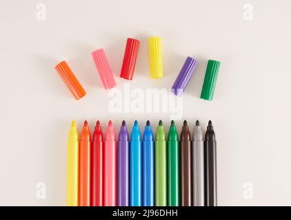 Colored markers on white background Stock Photo