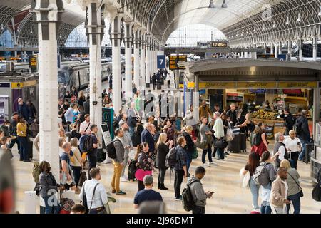 evening passengers, commuters waiting for their trains at the concourse London Paddington Station England UK Stock Photo