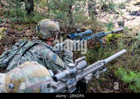 Two snipers of the 68th Armour Regiment's 1st Battalion are pictured with  their M107 Long Range