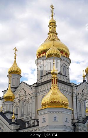 orthodox church with golden domes, Trinity cathedral and bell tower in Pochaev Lavra Pochayiv Lavra , Ukraine Stock Photo