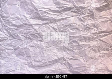 White color crumpled baking parchment paper textured background Stock Photo