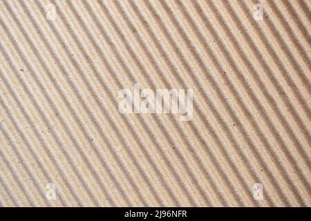 Brown color corrugated cardboard textured background with diagonal ridges Stock Photo