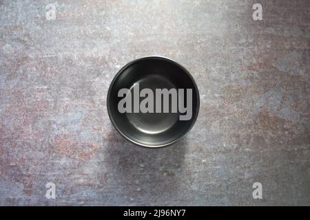 Black color empty round ceramic bowl Stock Photo