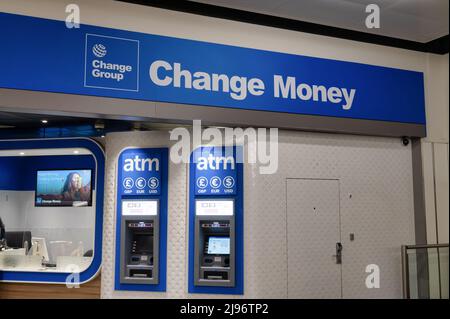 Gatwick Airport, UK- May 3, 2022; The Change Group Change money kiosk and ATM at Gatwick Airport Stock Photo