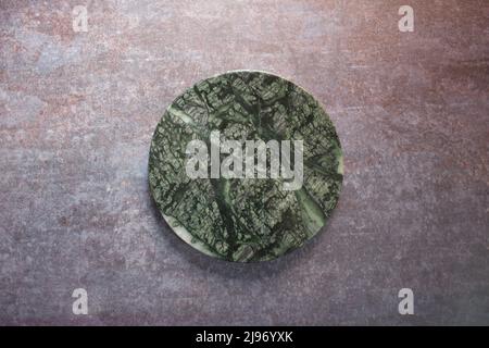 Green marble round rolling board Stock Photo