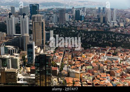 Aerial view of city downtown including Levent, Gülbağ and Gayrettepe districts with Zincirlikuyu cemetery. Stock Photo