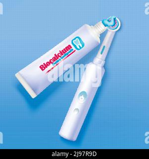 Modern electric toothbrush and tube of toothpaste on blue background ...