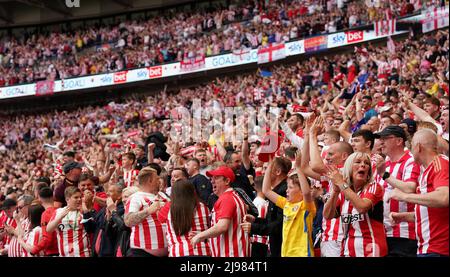 Sunderland fans celebrate after their side scores the first goal during the Sky Bet League One play-off final at Wembley Stadium, London. Picture date: Saturday May 21, 2022. Stock Photo