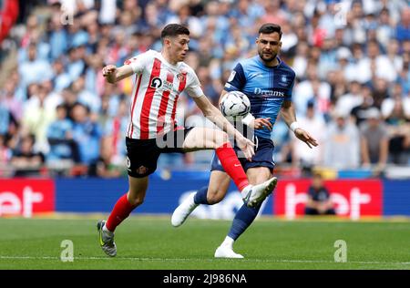 Sunderland's Lynden Gooch (left) and Wycombe Wanderers' Ryan Tafazolli battle for the ball during the Sky Bet League One play-off final at Wembley Stadium, London. Picture date: Saturday May 21, 2022. Stock Photo