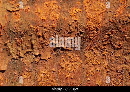 Embossed old ragged rusty metal surface, grunge background. Stock Photo