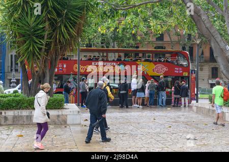 Palma de Mallorca, Mallorca, Spain - 05.03.2022: Tourists boarding city sightseeing bus Stock Photo