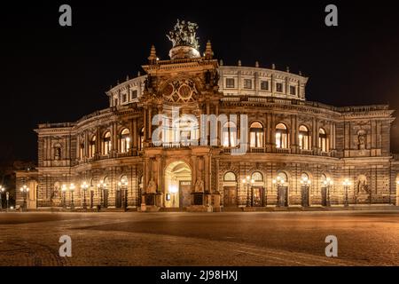 The Semper Opera House in Dresden by night with light. Is the opera house of the Saxon State Dresden. Stock Photo