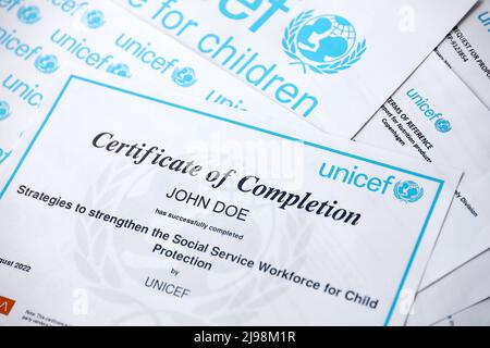 TERNOPIL, UKRAINE - MAY 2, 2022: Volunteer certificate of completion from UNICEF - United Nations programm that provides humanitarian and developmenta Stock Photo