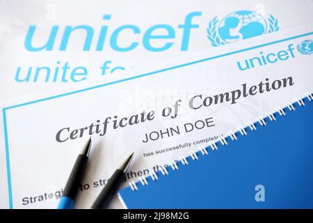 TERNOPIL, UKRAINE - MAY 2, 2022: Volunteer certificate of completion from UNICEF - United Nations programm that provides humanitarian and developmenta Stock Photo