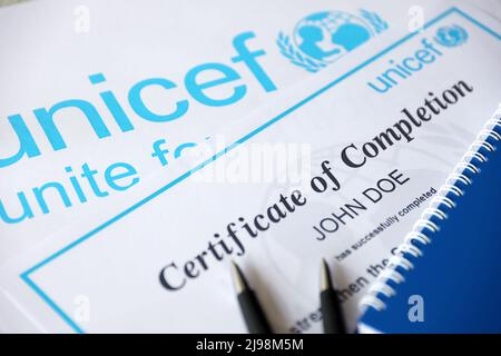 TERNOPIL, UKRAINE - MAY 2, 2022: Volunteer certificate of completion from UNICEF - United Nations programm that provides humanitarian and developmenta Stock Photo