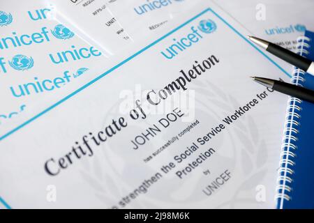 TERNOPIL, UKRAINE - MAY 2, 2022: Volunteer certificate of completion from UNICEF - United Nations programm that provides humanitarian and developmenta Stock Photo