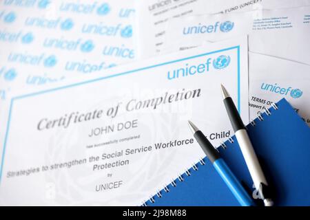 TERNOPIL, UKRAINE - MAY 2, 2022: Volunteer certificate of completion from UNICEF - United Nations programm that provides humanitarian and developmenta Stock Photo