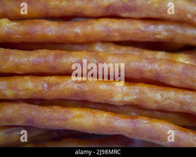 Traditional Polish sausages kabana, close-up shot, full frame. Kabanos, also known as cabanossi or kabana, is a long, thin, dry sausage usually made o Stock Photo