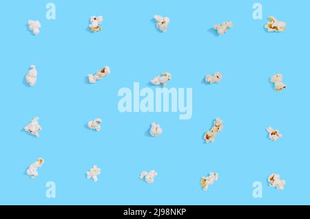 Popcorn seamless pattern on blue background. Top view Stock Photo