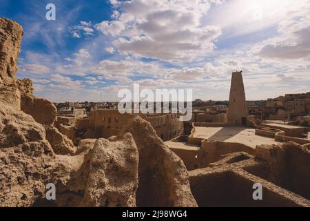 Panoramic View to the Sandstone Walls and Ancient Fortress of an Old Shali Mountain village in Siwa Oasis, Egypt Stock Photo