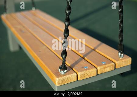 Swing is in details. Playground. Place to relax. Swing. Stock Photo