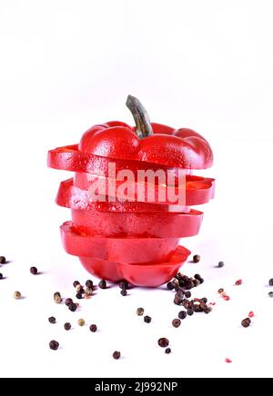 red pepper with water drops on white background Stock Photo