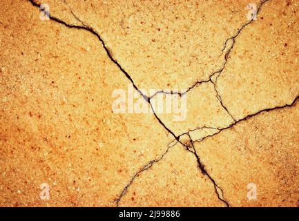 abstract background or texture crack on orange stone tiling Stock Photo