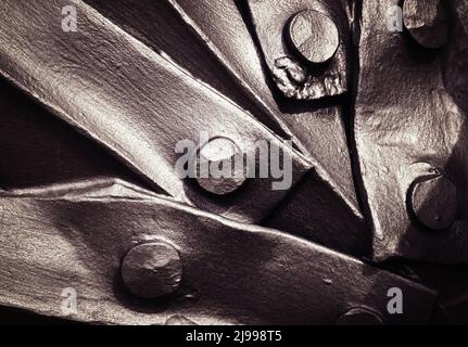 abstract background dark riveted joints wrought iron Stock Photo