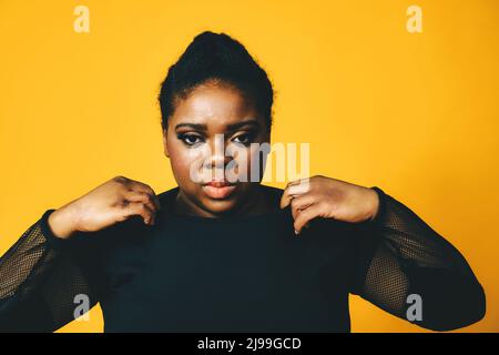 Closeup of frustrated afro girl with crossed arms Stock Photo - Alamy