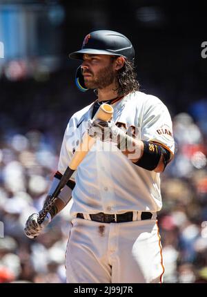 Cleveland, Ohio. 4th May, 2022. San Diego Padres second baseman Jake  Cronenworth (9) hits a sacrifice fly in the sixth inning during game one of  an MLB doubleheader against the Cleveland Guardians