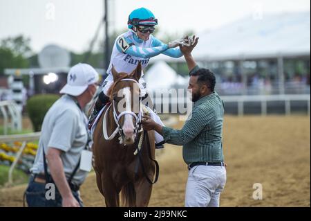 Balitmore, United States. 21st May, 2022. Jockey Chantal Sutherland celebrates winning The Chick Lang Stakes with Lightening Larry at the Pimlico Race Course in Baltimore, Maryland on Saturday, May 21, 2022. Photo by Bonnie Cash/UPI Credit: UPI/Alamy Live News Stock Photo