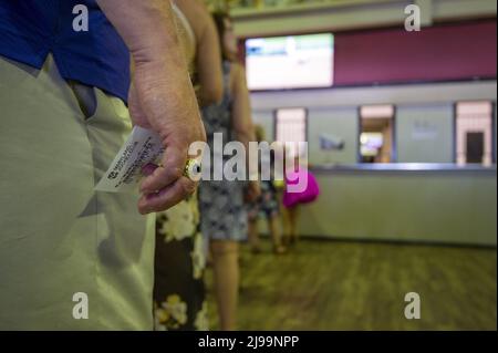 Balitmore, United States. 21st May, 2022. People gather to place their bets at the Pimlico Race Course in Baltimore, Maryland on Saturday, May 21, 2022. Photo by Bonnie Cash/UPI Credit: UPI/Alamy Live News Stock Photo