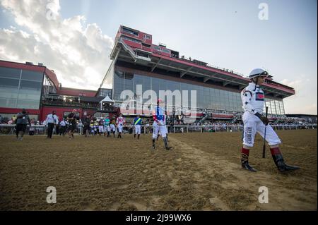 Balitmore, United States. 21st May, 2022. Jockeys head to the paddock to prepare for the 147th Preakness Stakes at the Pimlico Race Course in Baltimore, Maryland on Saturday, May 21, 2022. Photo by Bonnie Cash/UPI Credit: UPI/Alamy Live News Stock Photo