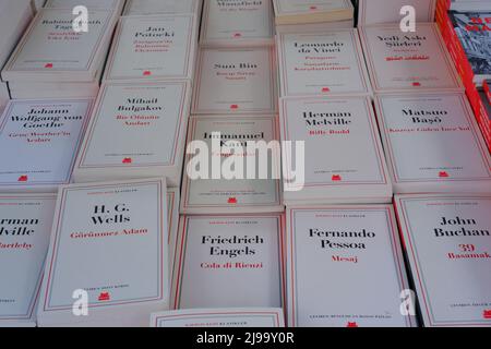 Books in Turkish displayed on table for sale at a book fair Stock Photo