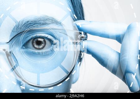Young woman with iris scanning, closeup view Stock Photo