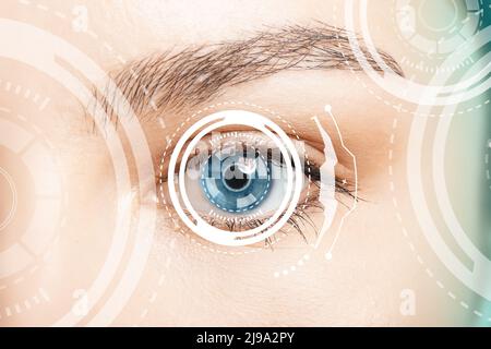 Young woman with iris scanning, closeup view Stock Photo