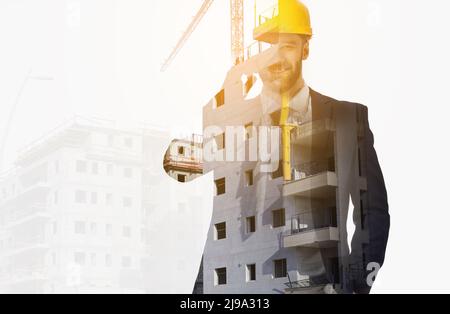 Double exposure of architect and buildings on white background Stock Photo