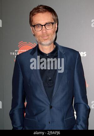 May 21, 2022 - London, England, UK - Stephen Merchant attending BFI & Radio Times Television Festival: The Outlaws TV screening Photocall Stock Photo