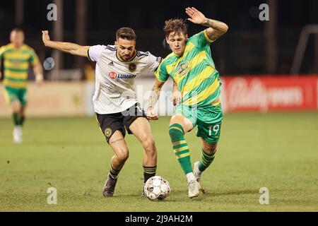 St. Petersburg, FL: Pittsburgh Riverhounds SC defender Arturo Ordóñez (15) and Tampa Bay Rowdies forward Jake LaCava (19) vie for the loose ball durin Stock Photo