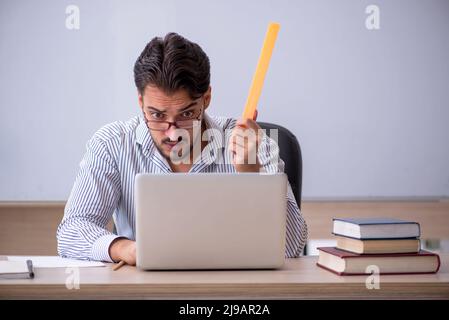 Young teacher in telestudy concept Stock Photo