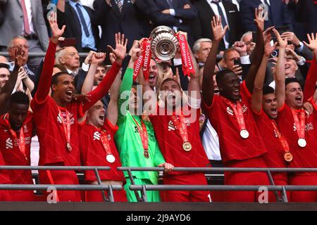 Jordan Henderson of Liverpool holds the FA Cup Trophy aloft as he and team mates celebrate - Chelsea v Liverpool, The Emirates FA Cup Final, Wembley Stadium, London - 14th May 2022  Editorial Use Only Stock Photo