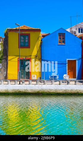 portugal multicolored houses over the river Stock Photo