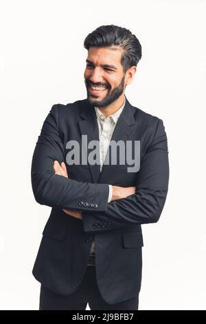 Vertical shot of a Latin bearded happy and smiling man in a black suit . High quality photo Stock Photo