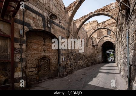 Historical oriental architecture in alley of old city of Damascus Stock Photo