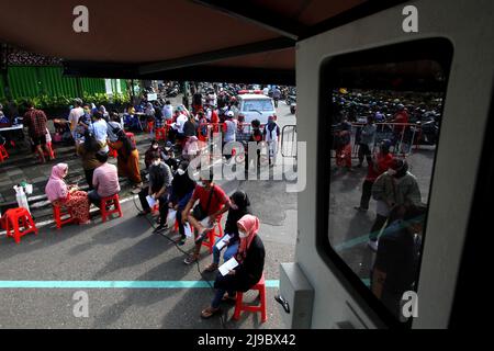 People Wait In Line Before Praying, On Their Traditional New Year's 