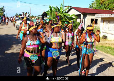 PUNTA GORDA, BELIZE - SEPTEMBER 10, 2015 crowd of dancing girls at the St. George’s Caye Day celebrations and carnival Stock Photo