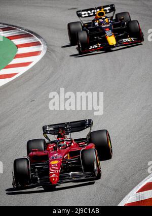 BARCELONA - Charles Leclerc (16) driving the Ferrari and Max Verstappen (1) driving the Oracle Red Bull Racing RB18 Honda during the F1 Grand Prix of Spain at Circuit de Barcelona-Catalunya on May 22, 2022 in Barcelona, Spain. REMKO DE WAAL