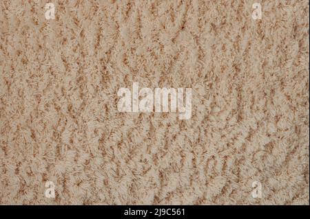 Beige color textile soft carpet pattern background texture Stock Photo