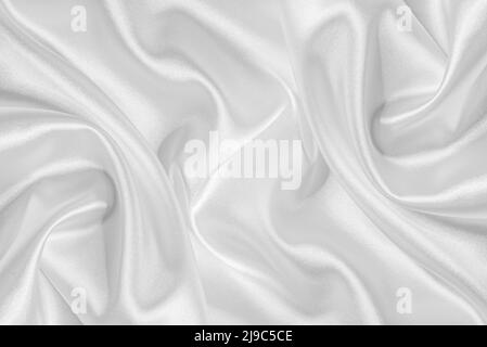 Closeup of rippled white silk fabric. Stock Photo