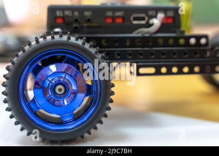 programmable children's robot car in the form of a platform on wheels Stock Photo